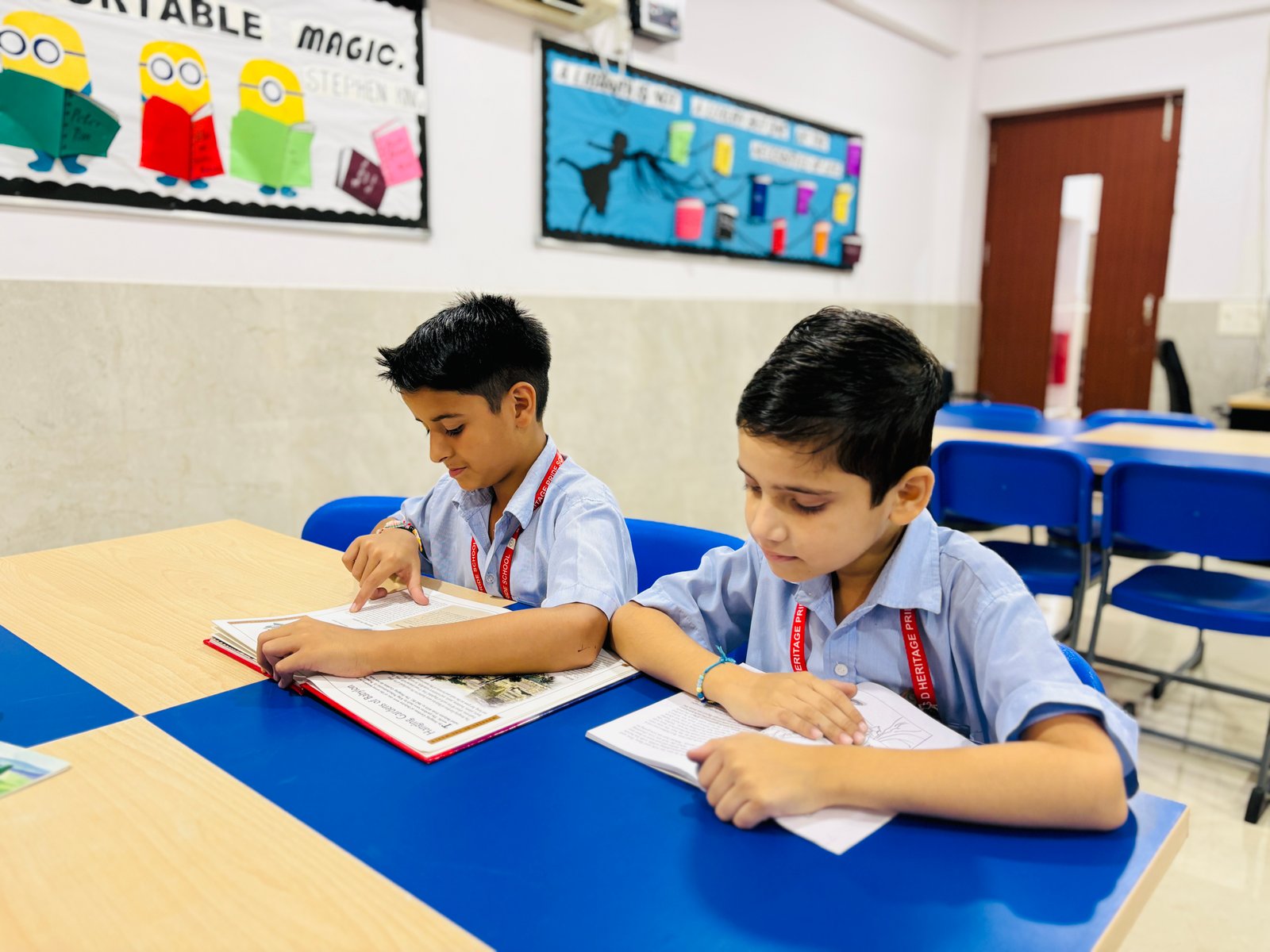 Child writing in classroom